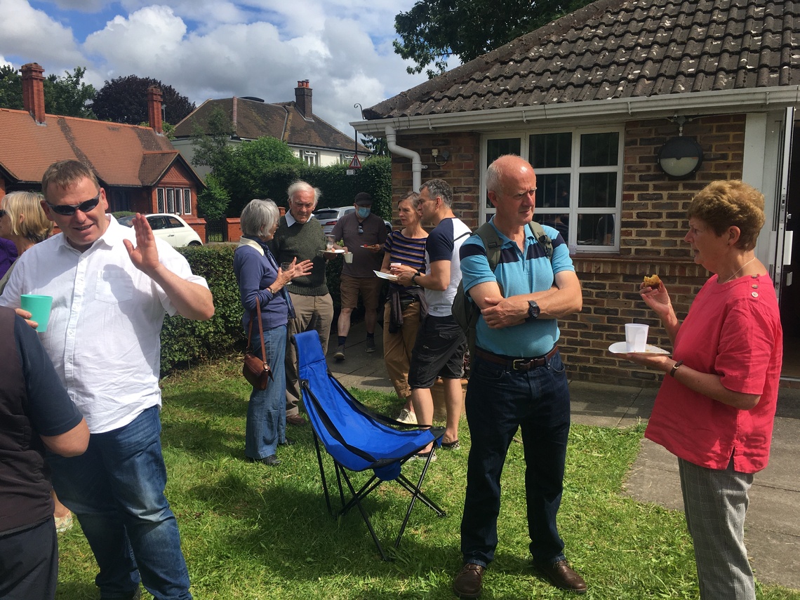 Group mingling in garden